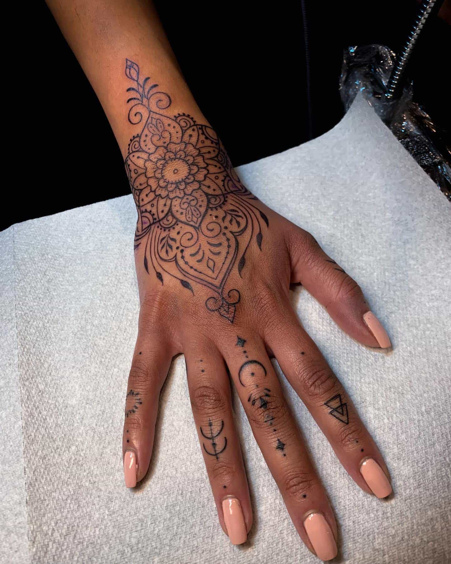 pretty hand tattoos for women