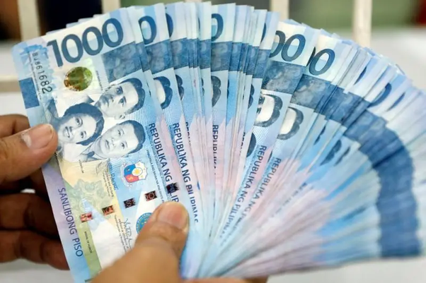 70000 philippine pesos to dollars