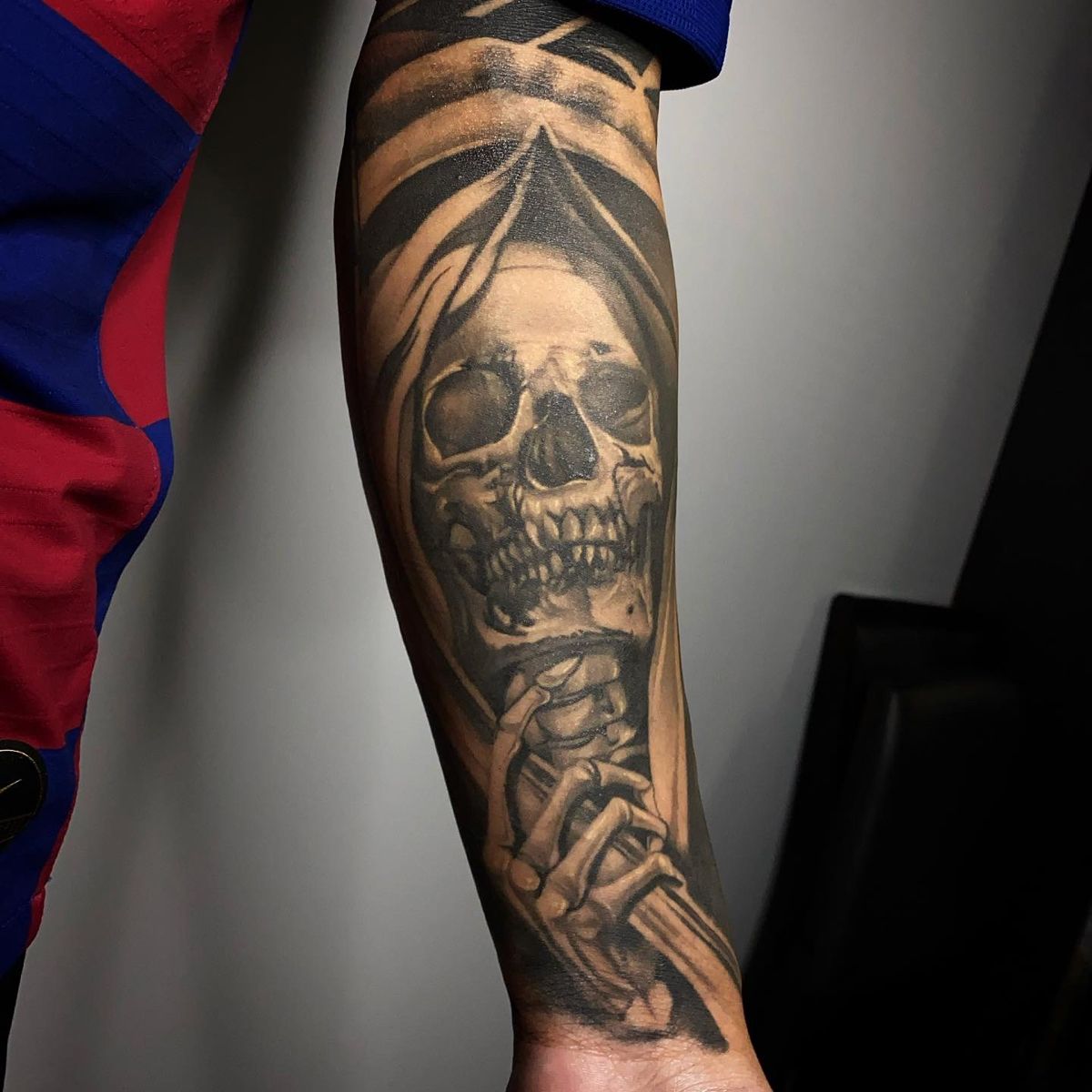 grim reaper tattoos on forearm