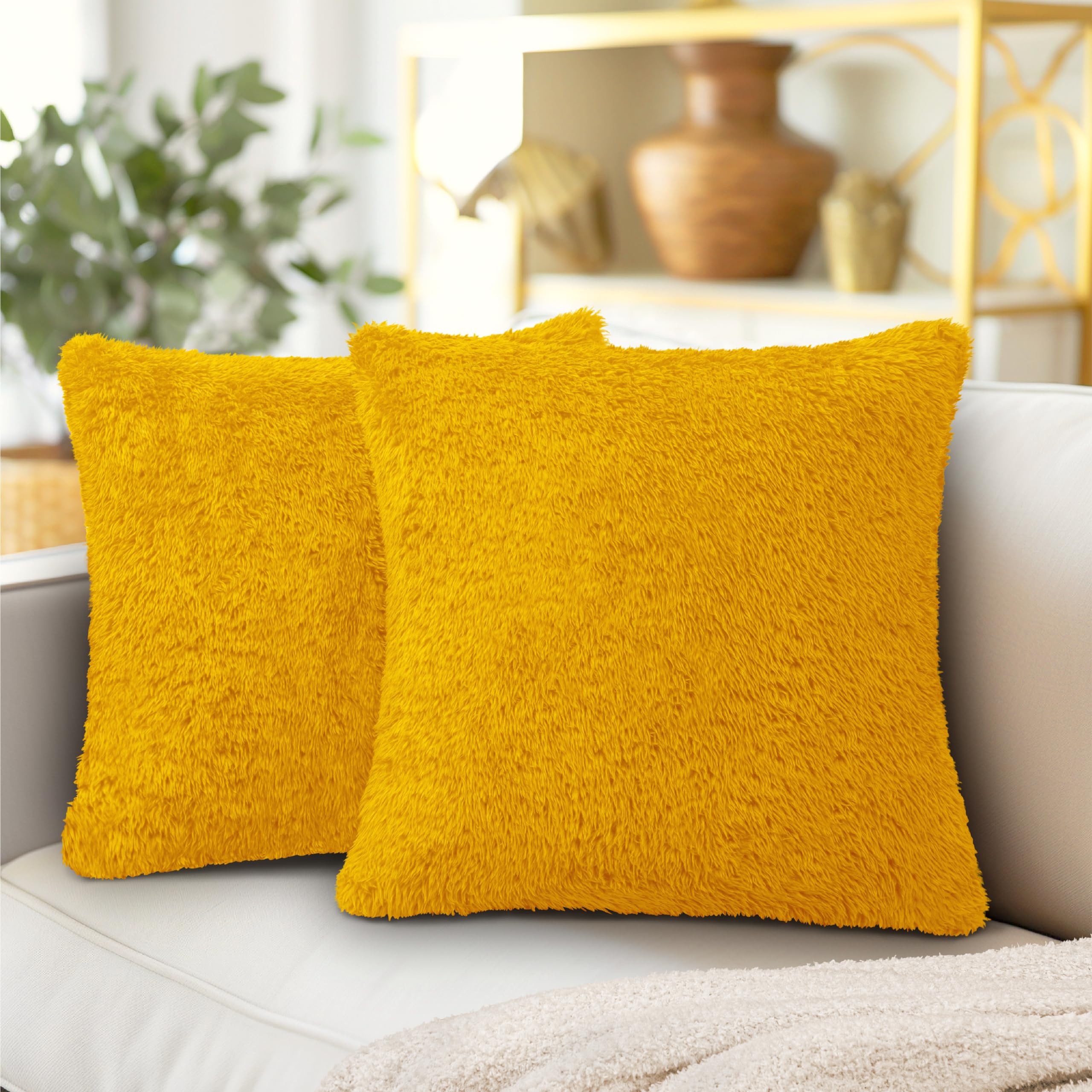 yellow pillows and throws