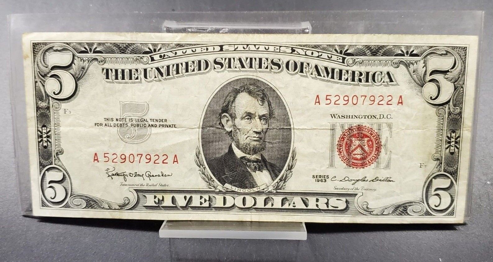 red five dollar bill