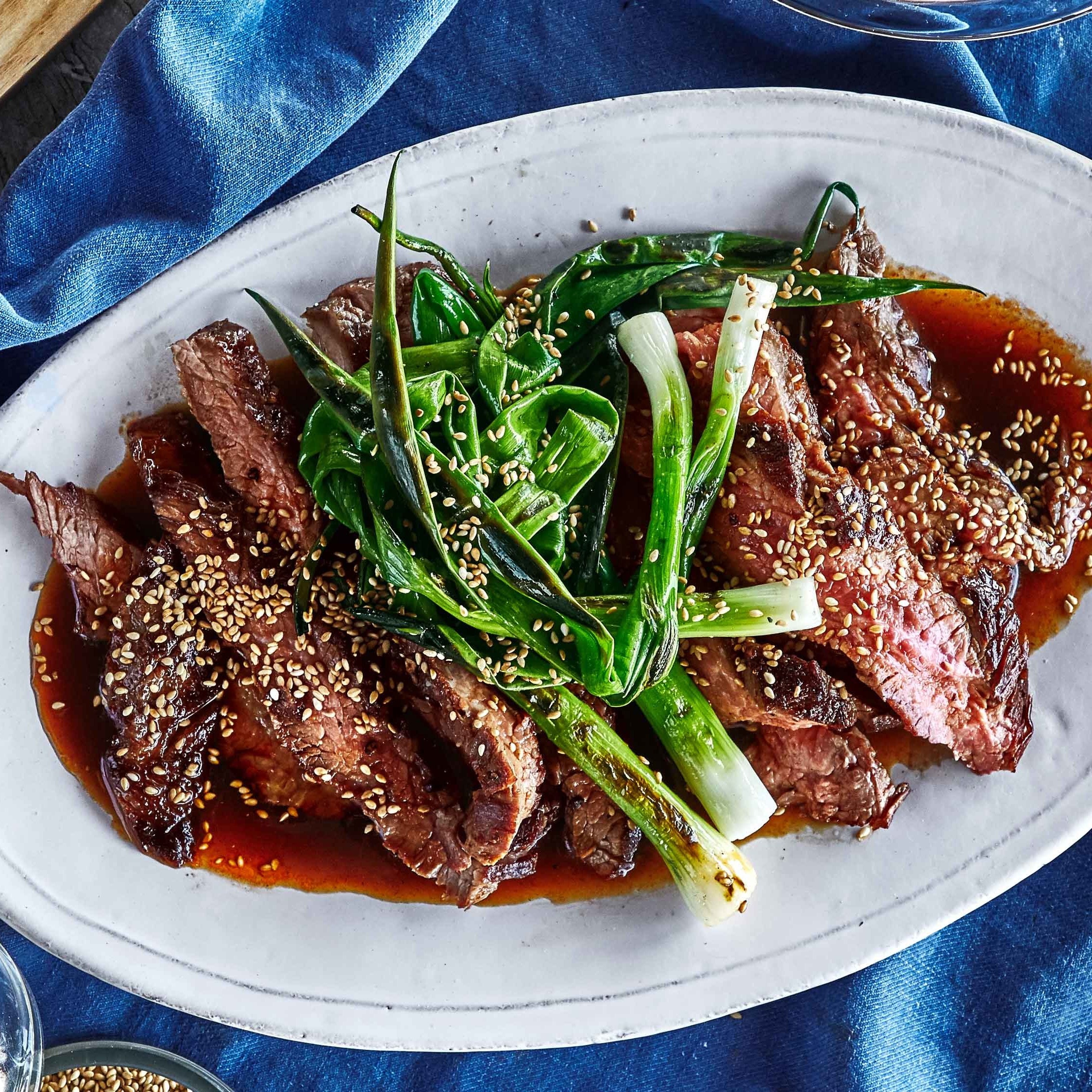 japanese dish of meat marinated in soy sauce crossword clue