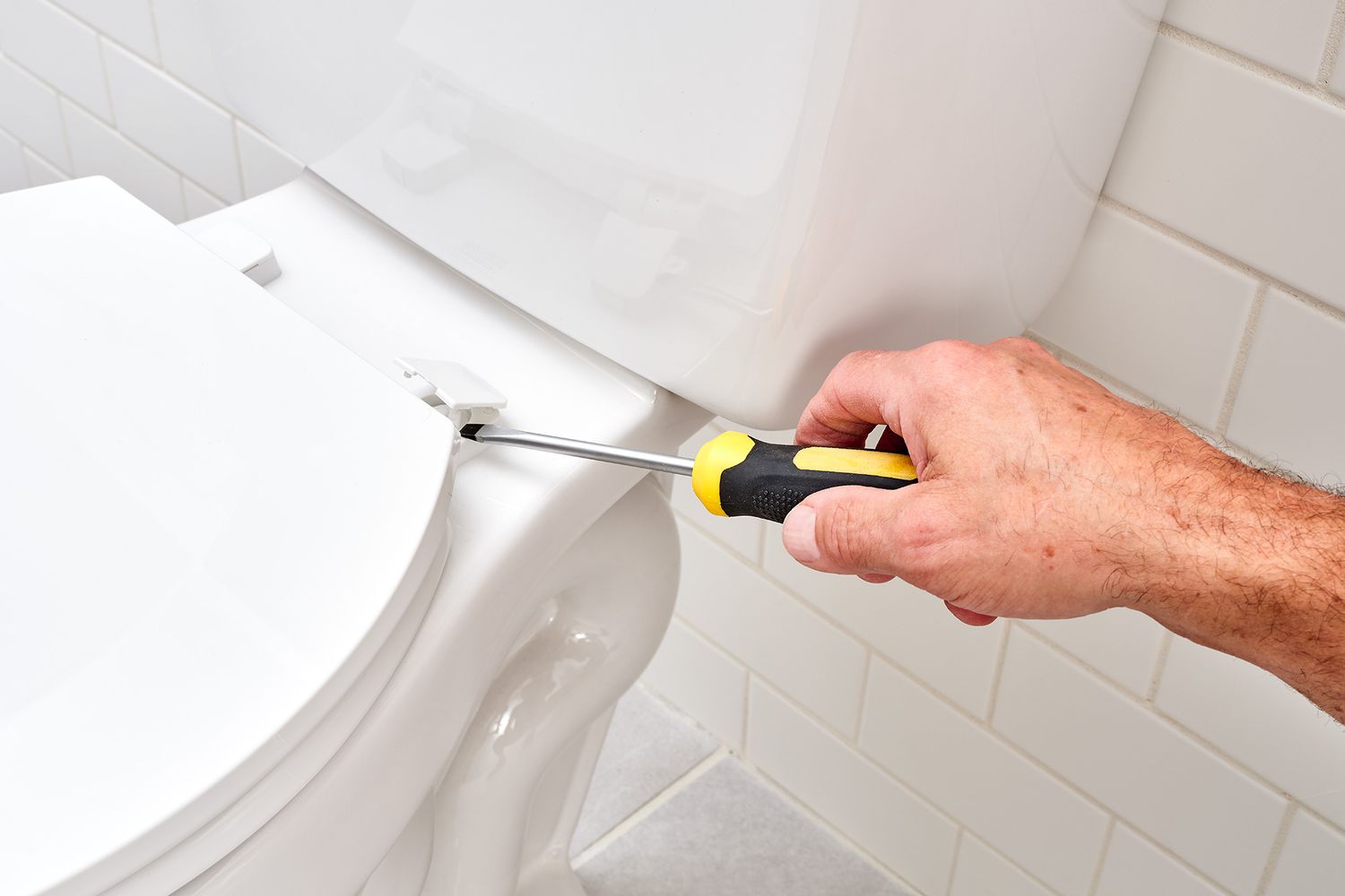 how to tighten toilet lid