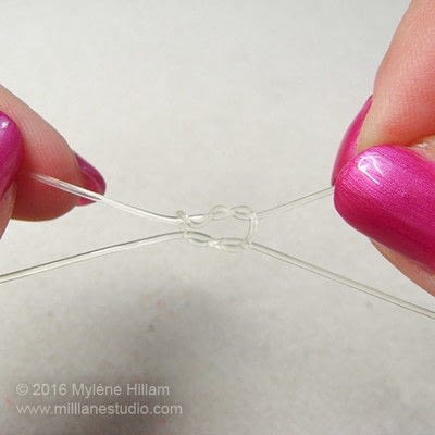 how to tie a clear string bracelet