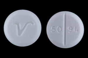 v white round pill