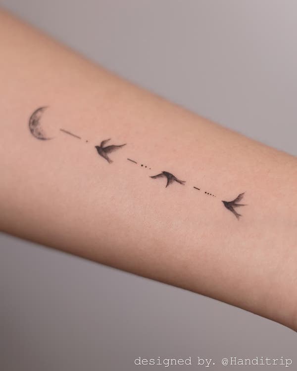 black birds flying tattoo meaning