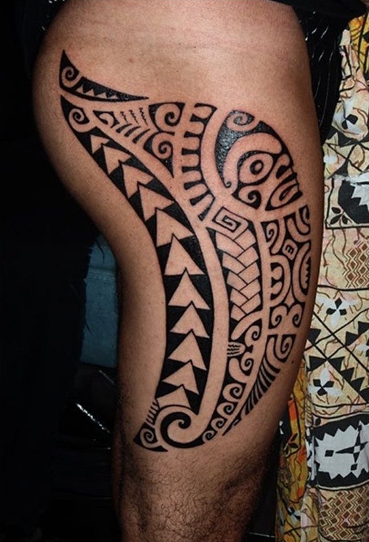 tribal tattoo on thigh