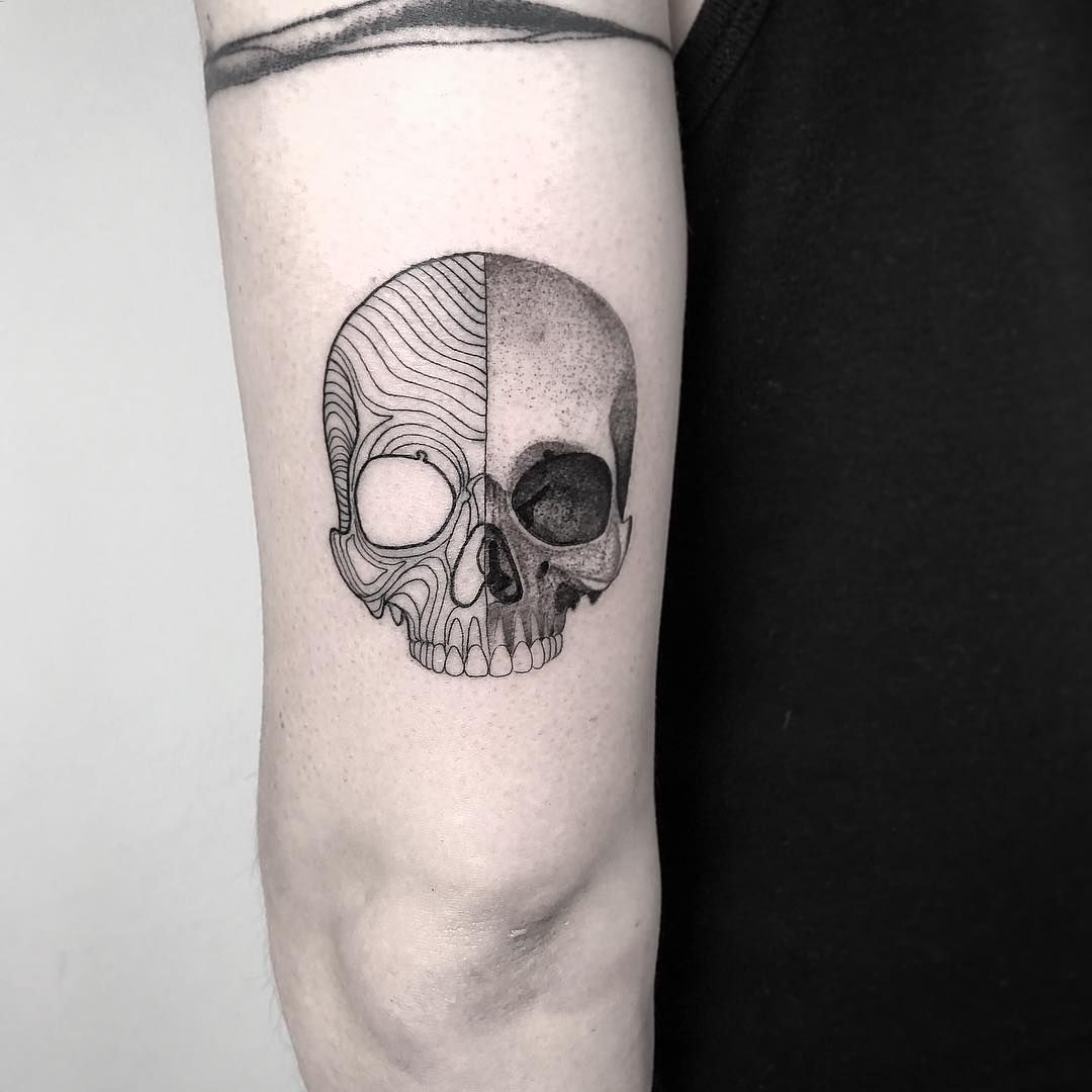 minimalist skull tattoo