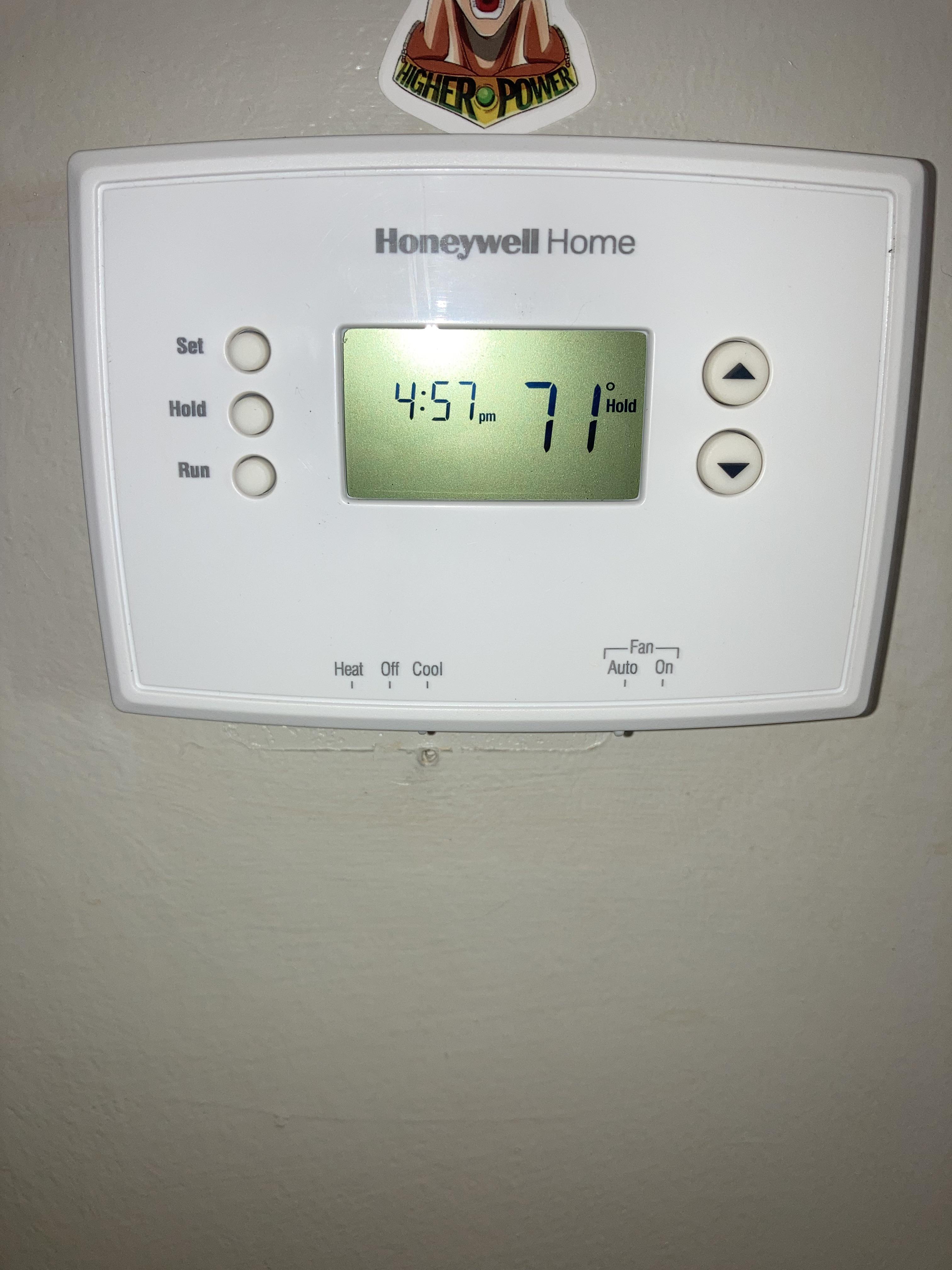 how to take a honeywell thermostat off the wall