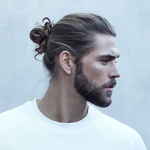 man bun hairstyle with beard