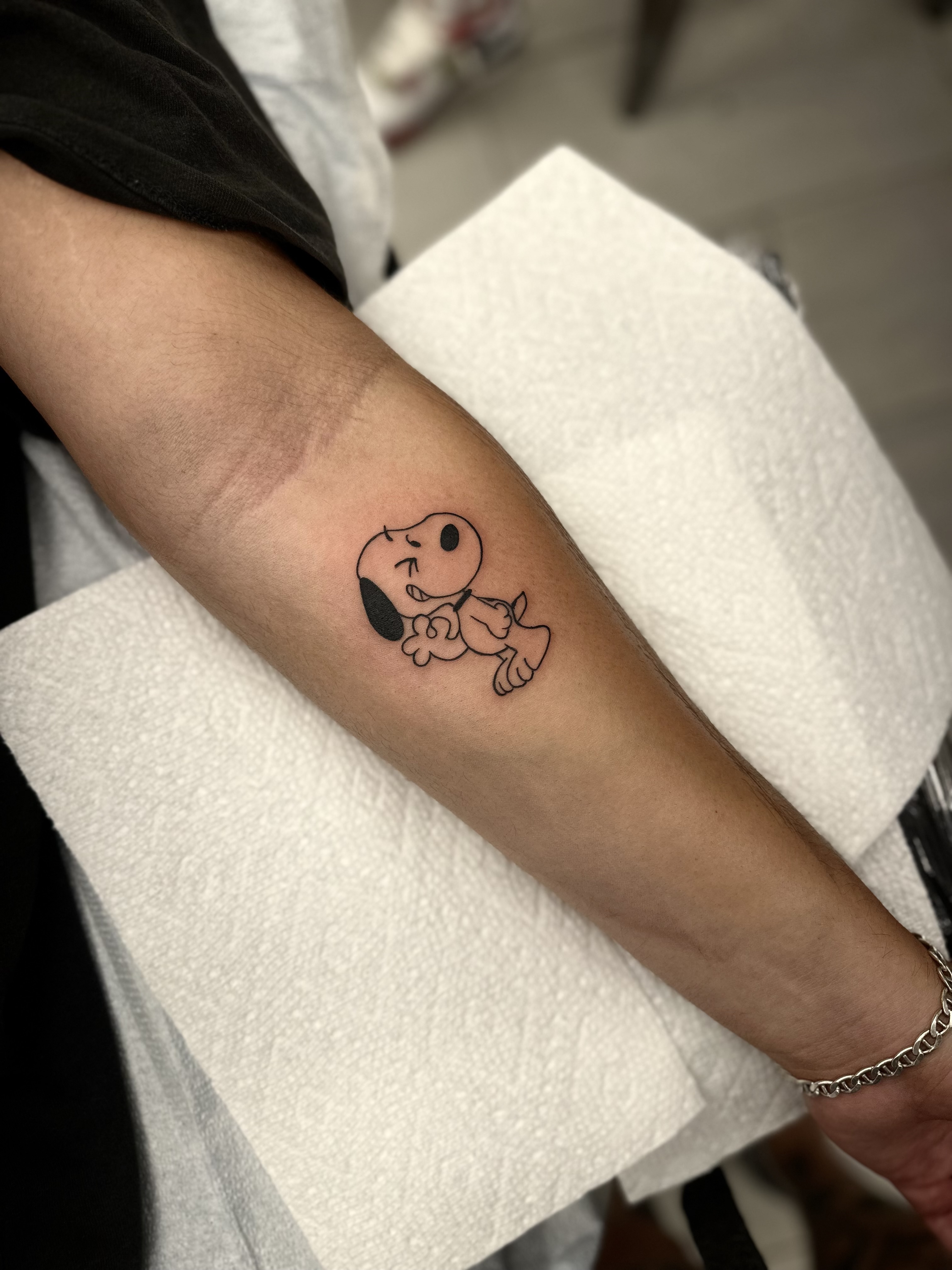 tatuaje snoopy