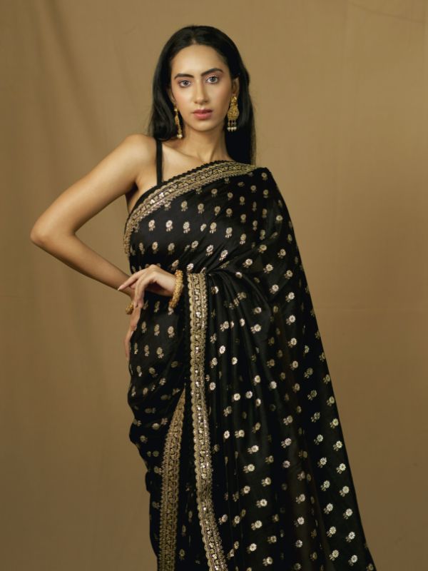 black saree with golden dots