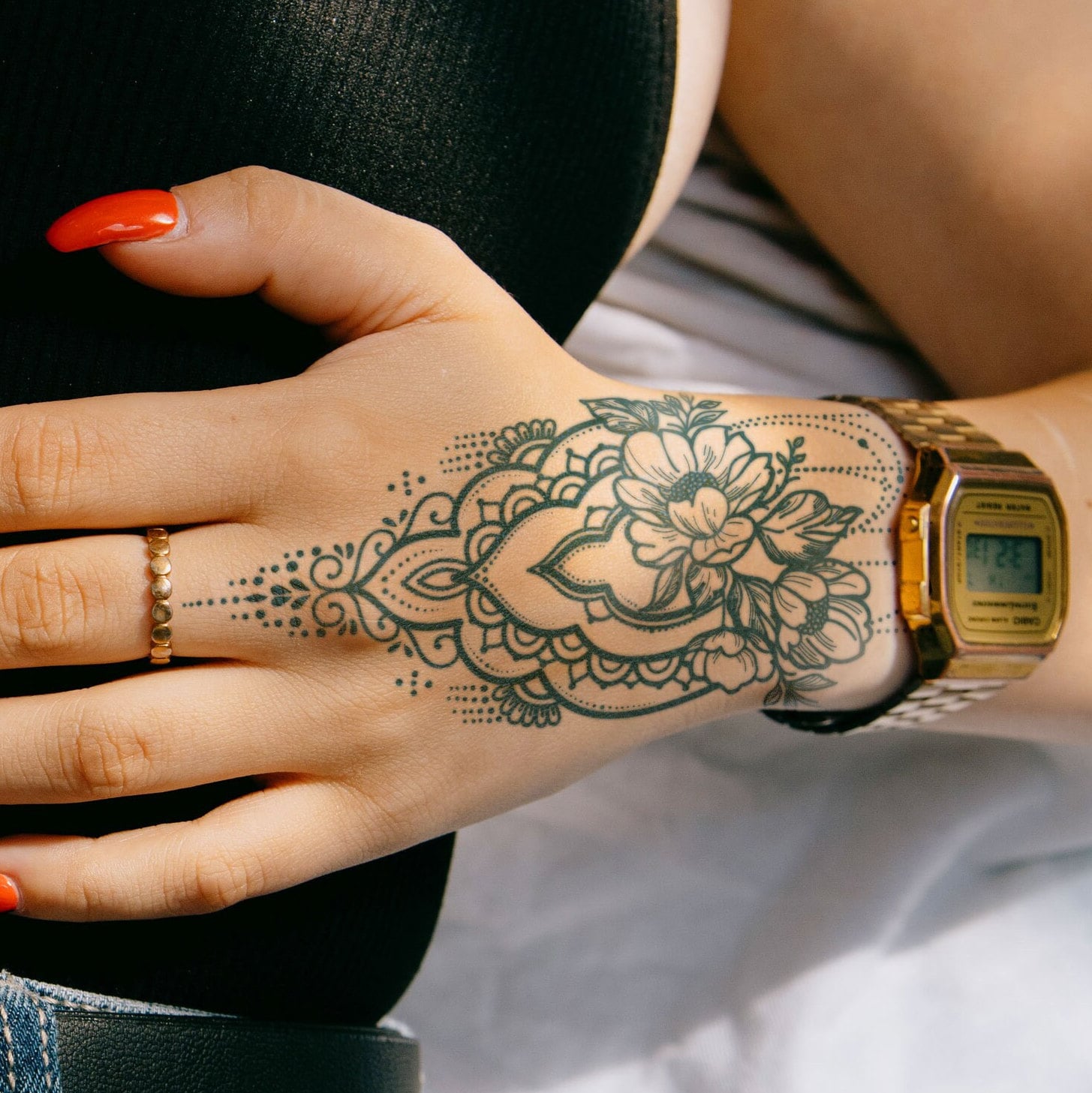 hand mandala tattoos