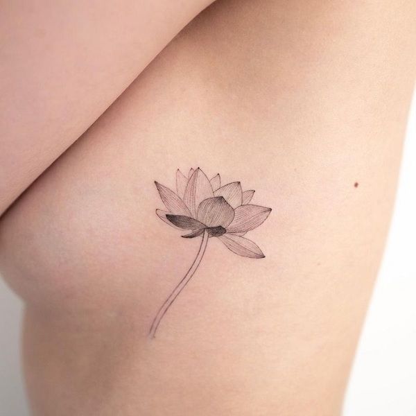 simple water lily tattoo