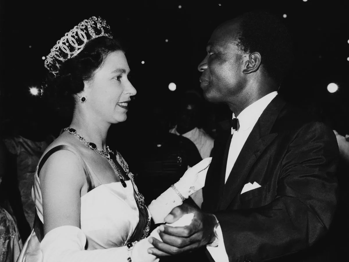 queen elizabeth dancing with african