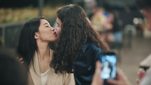 lesbians kissing asian