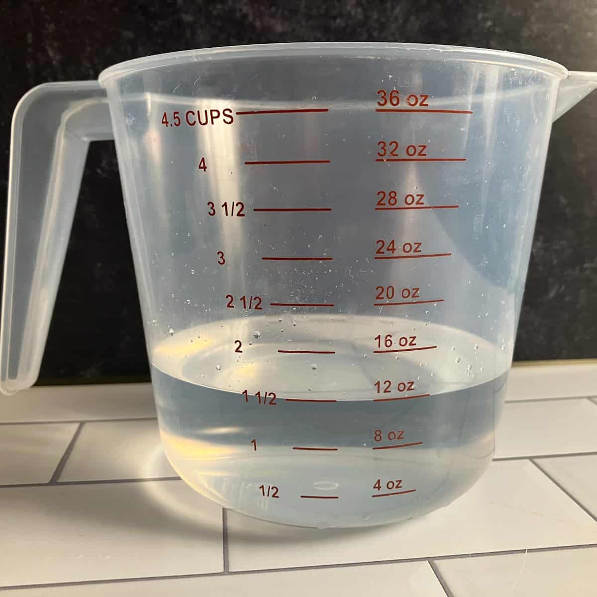 how many milliliters in an ounce of liquid