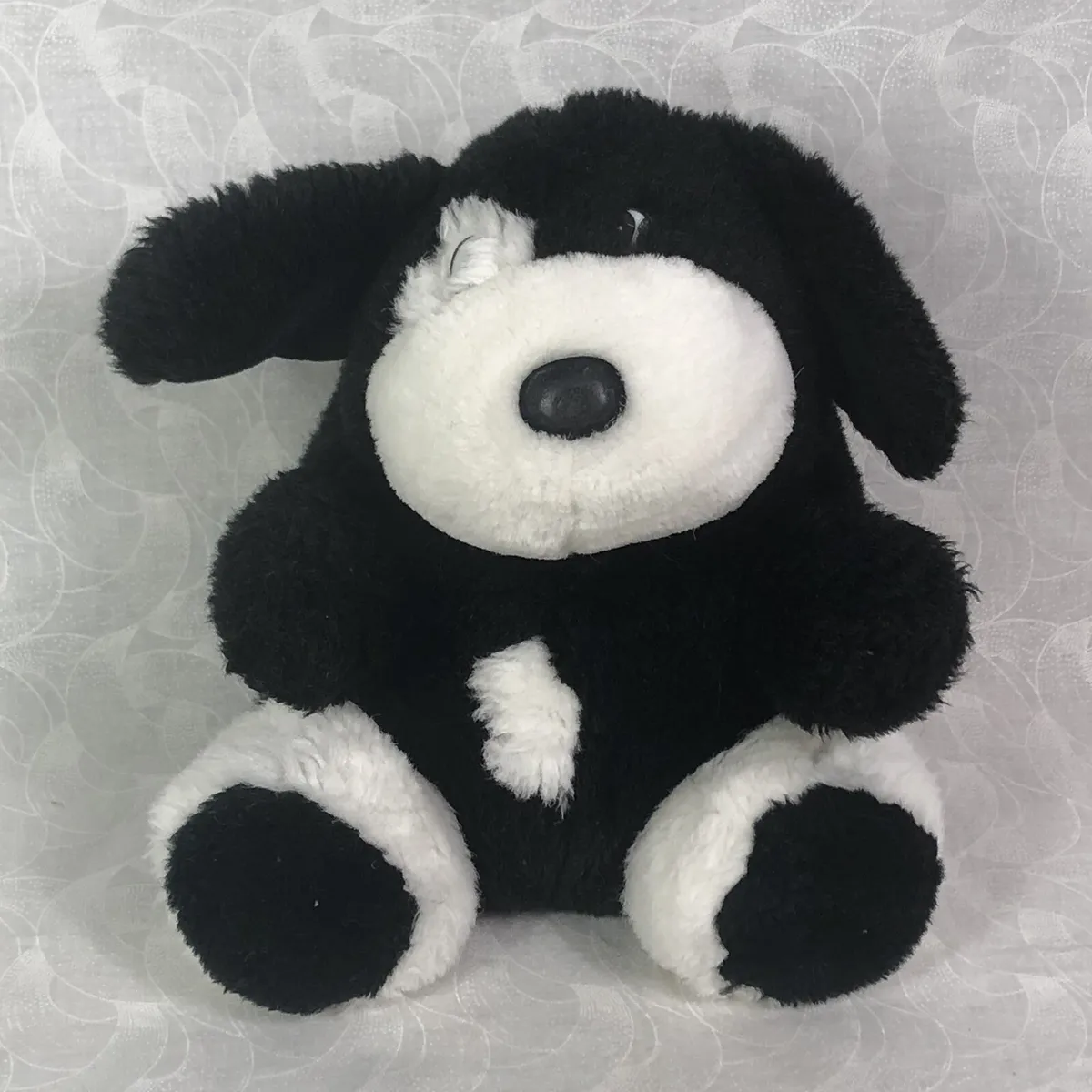 black and white dog stuffed animal