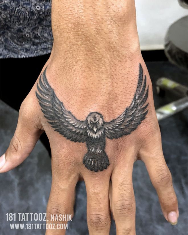 eagle tattoo on hand boy