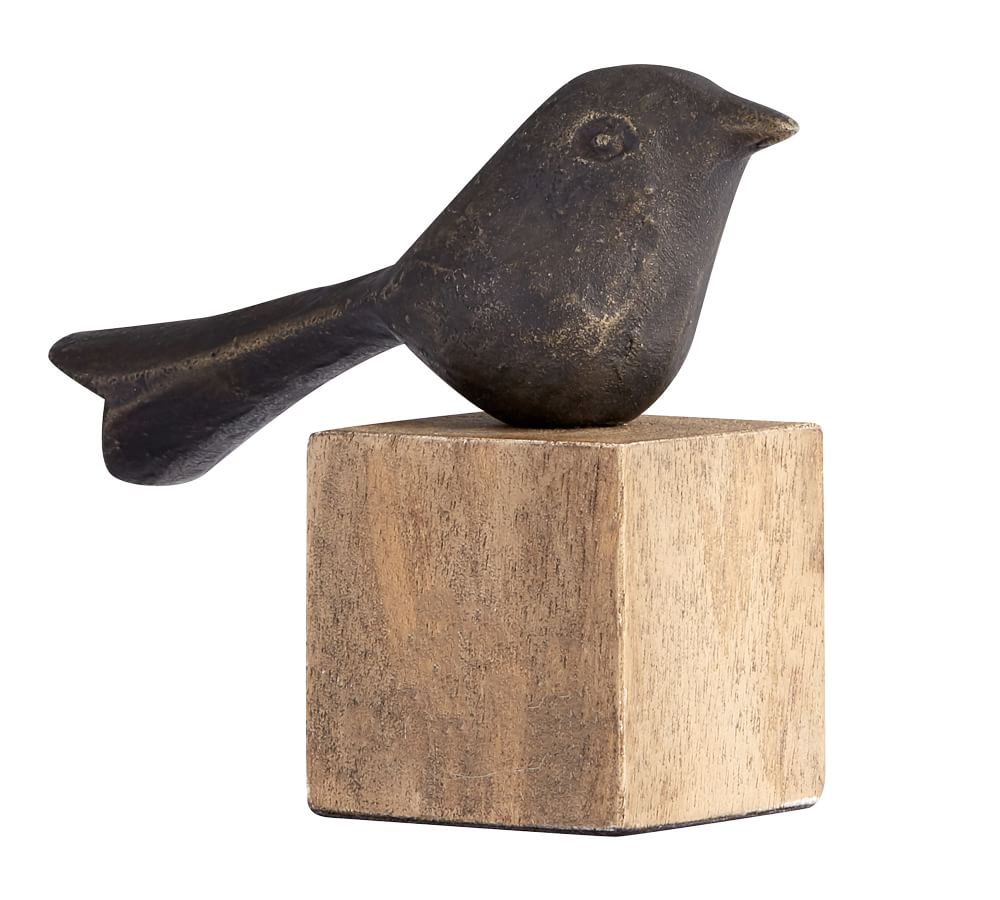 decorative birds on wooden stand