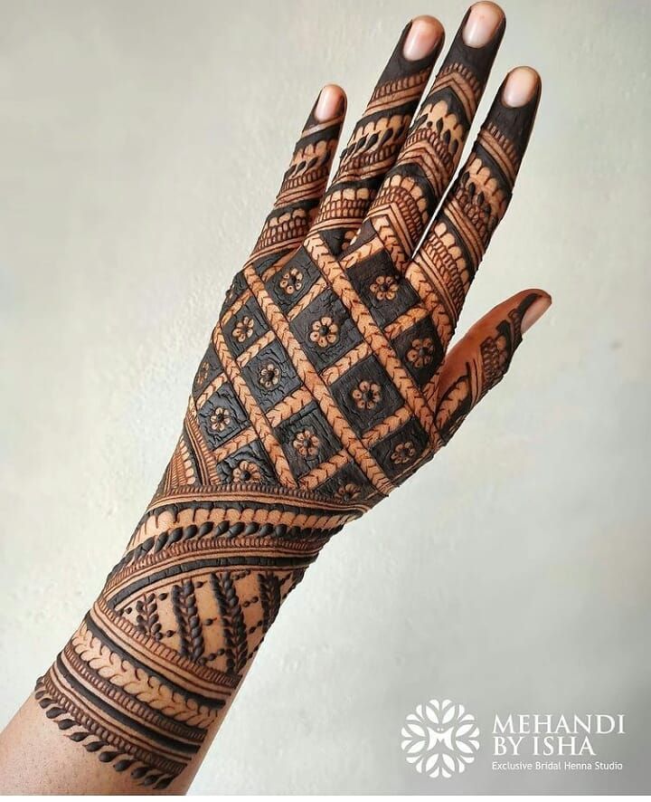 mehndi design behind hand