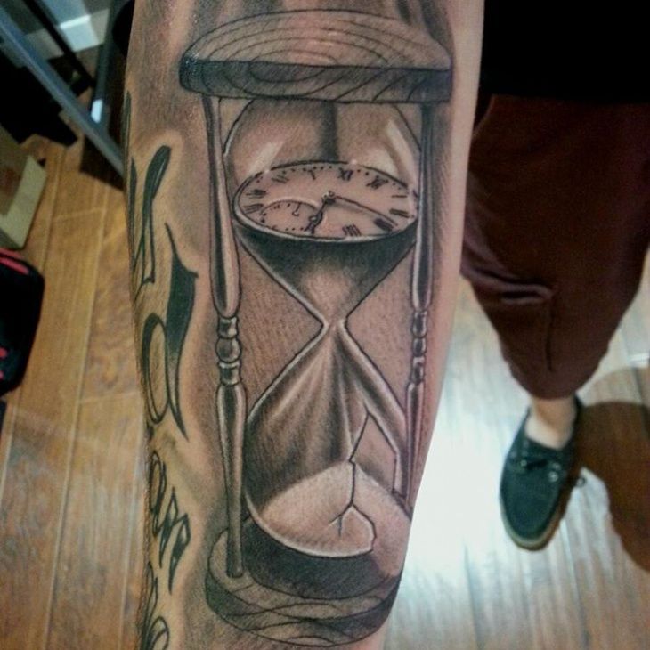 sand clock tattoo meaning