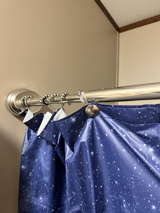 shower curtain rod stuck