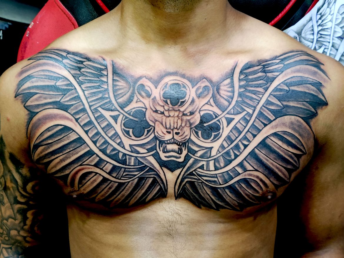 tattoo wings on chest