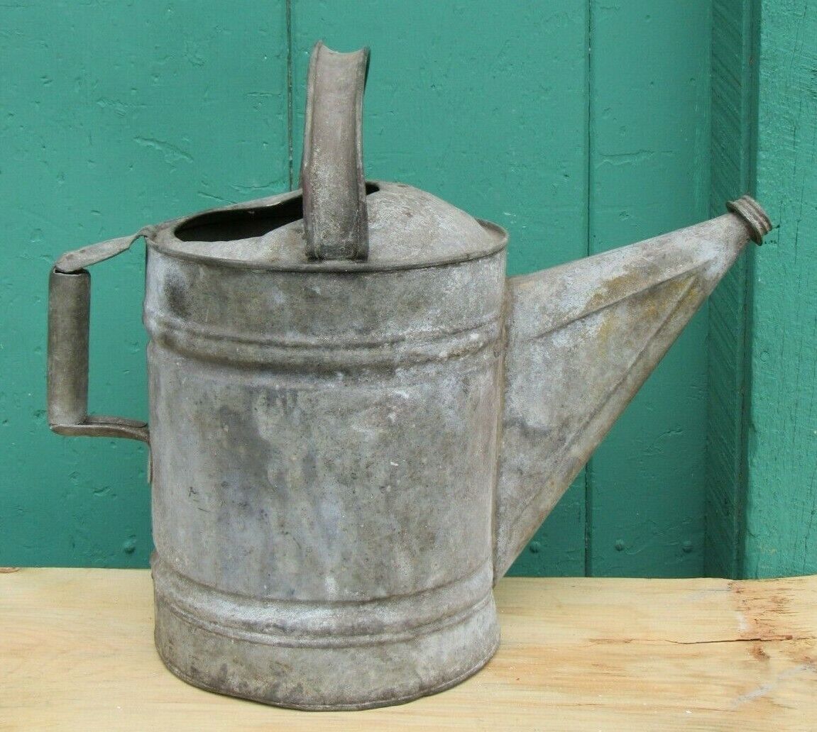 vintage metal watering can